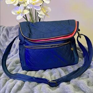 Travelon Blue Crossbody Bag with Pink Accent